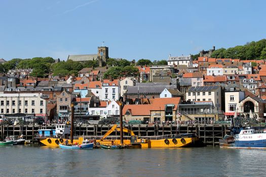 SCARBOROUGH HARBOR, SCARBOROUGH, NORTH YORKSHIRE, ENGLAND - 19th May 2014: Scarborough harbour on the 19th of May 2014. Scarborough town is a popular tourist destination every summer, particularly from visitors from European countries.