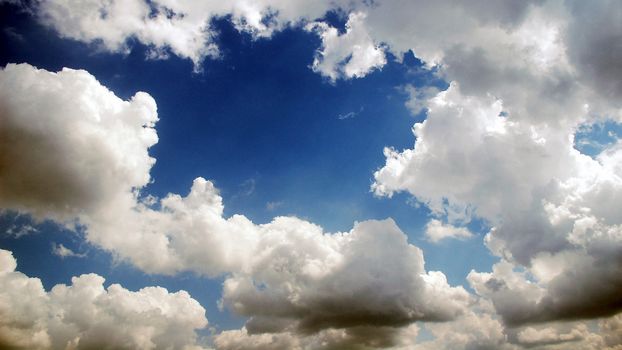 The blue sky with clouds