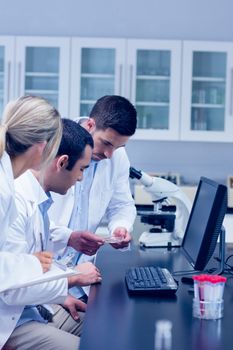 Science students working together in the lab at the university