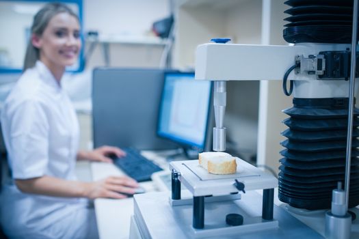 Food scientist using technology to analyse bread at the university