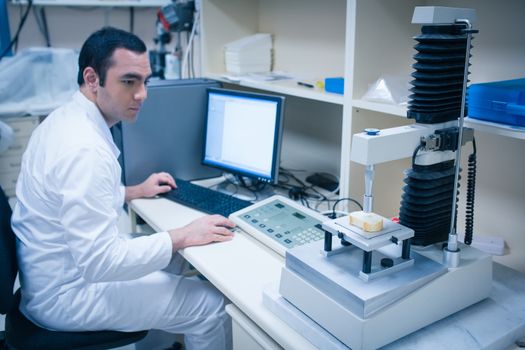 Food scientist using technology to analyse bread at the university