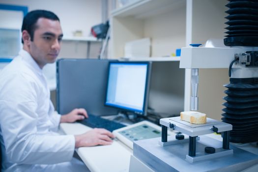 Food scientist using technology to analyse bread at the university