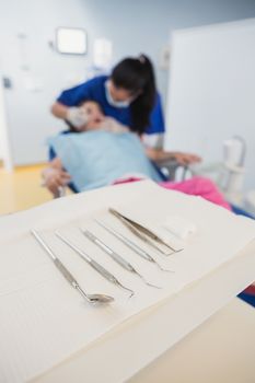 View in dental equipment in front of a dentist examining a petient