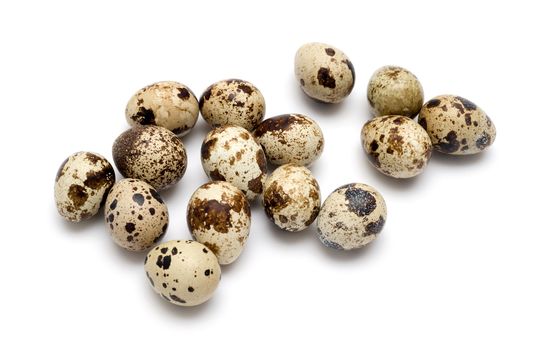 Quail eggs isolated on white background.