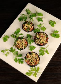 Appetizer of fried eggplant stuffed with vegetables and cheese