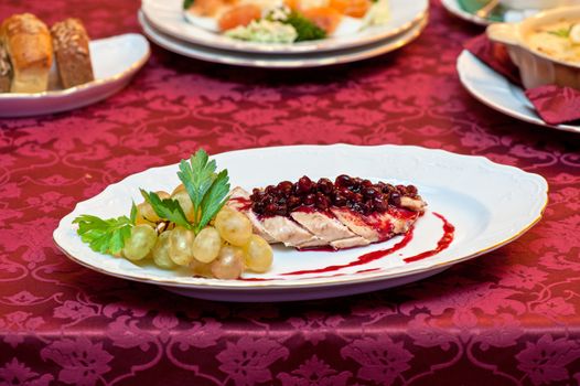 chicken breast meat with cranberry sauce
