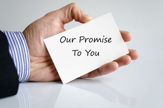 Bussines man hand with text Our promise to you