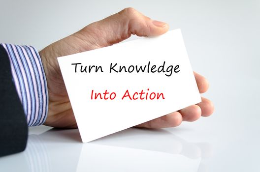 Bussines man hand with text Turn Knowledge Into Action
