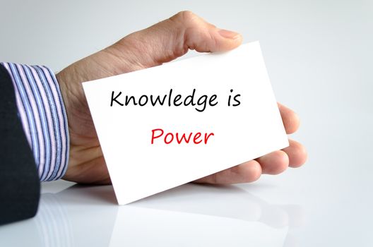 Knowledge is power note in bussines man hand