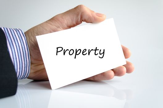 Bussines man hand with text Property