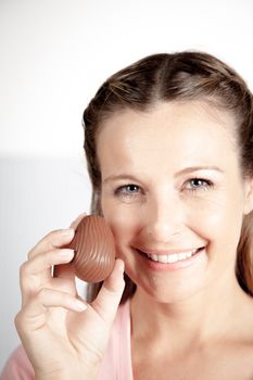 20-25, background, caucasian, decoration, easter, egg, event, felicity, female, giving, hand, handmade, happy, holding, hope, human, life, model, old, one, palm, people, person, portrait, property, releases, seasonal, show, showing, smile, smiling, studio, symbol, traditional, white, woman, years, young