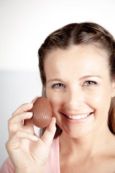 20-25, background, caucasian, decoration, easter, egg, event, felicity, female, giving, hand, handmade, happy, holding, hope, human, life, model, old, one, palm, people, person, portrait, property, releases, seasonal, show, showing, smile, smiling, studio, symbol, traditional, white, woman, years, young