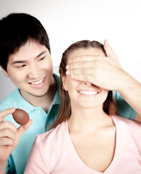 20-25, asian, background, caucasian, Couple, covering, decoration, easter, egg, event, felicity, female, giving, hand, handmade, happy, holding, hope, human, life, love, man, model, old, one, palm, people, person, portrait, property, releases, seasonal, show, showing, smile, smiling, studio, surprise, symbol, together, traditional, white, woman, years, young