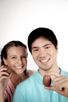 20-25, asian, background, caucasian, Couple, covering, decoration, easter, egg, event, felicity, female, giving, hand, handmade, happy, holding, hope, human, life, love, man, model, old, one, palm, people, person, portrait, property, releases, seasonal, show, showing, smile, smiling, studio, surprise, symbol, together, traditional, white, woman, years, young