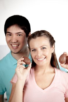 20-25, asian, background, caucasian, Couple, decoration, easter, egg, event, felicity, female, giving, hand, handmade, happy, hold, holding, hope, human, life, love, man, model, old, one, palm, people, person, portrait, property, releases, seasonal, show, showing, smile, smiling, studio, symbol, together, traditional, white, woman, years, young