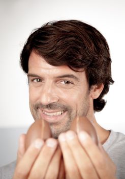 25-30, background, caucasian, decoration, easter, egg, event, felicity, giving, hand, handmade, happy, holding, hope, human, life, male, man, model, old, one, palm, people, person, portrait, property, releases, seasonal, show, showing, smile, smiling, studio, symbol, traditional, white, years, young