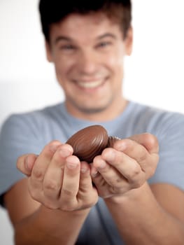 20-25, background, caucasian, decoration, easter, egg, event, felicity, giving, hand, handmade, happy, holding, hope, human, life, male, man, model, old, one, palm, people, person, portrait, property, releases, seasonal, show, showing, smile, smiling, studio, symbol, traditional, white, years, young