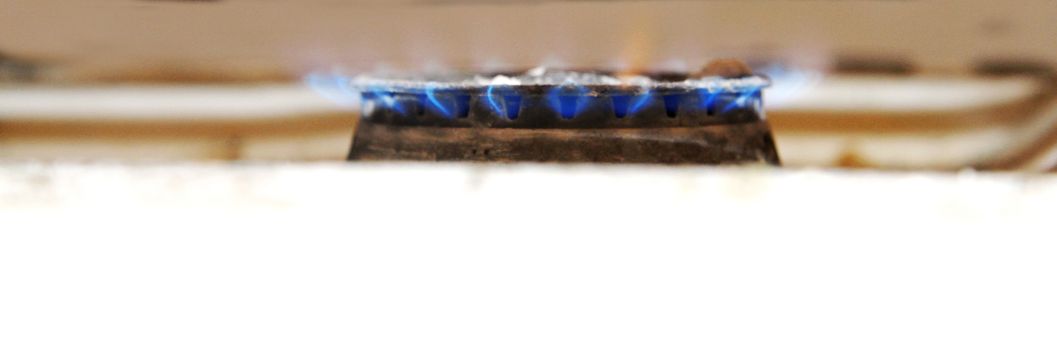 Blue Flames Of Gas Burning From A Kitchen Gas Stove