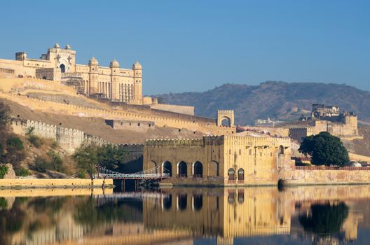 Amber fort reflection over the lake, Jaipur, Rajasthan, India 