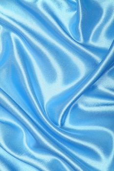 Smooth elegant blue silk or satin can use as background 