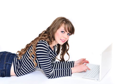 student girl working on laptop on the white background
