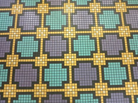 Squares of yellow, black, purple and turquoise