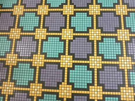 Squares of yellow, black, purple and turquoise
