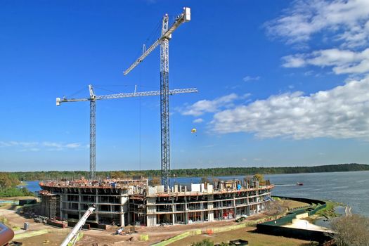 The construction of a building with 2 cranes