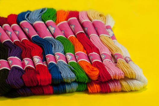 Embroidery Floss in skaine on yellow