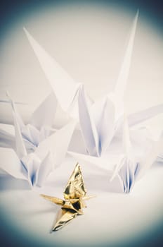 flock of origami cranes