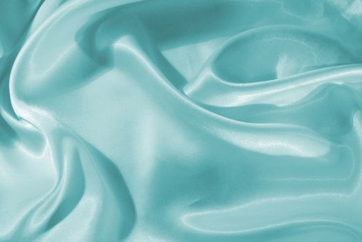 Smooth elegant blue silk or satin can use as background 