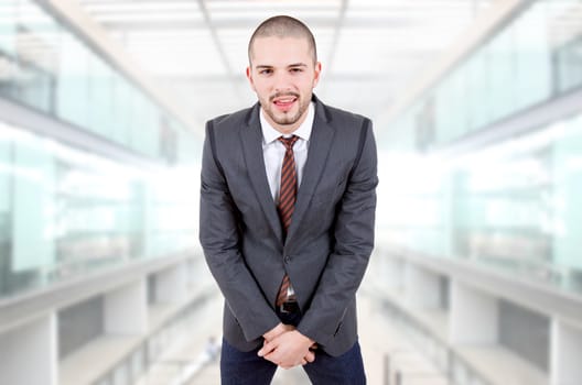 young silly business man portrait at the office