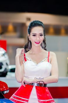 NONTHABURI - MARCH 24: Unidentified model  with MG on display at Thailand 35th Bangkok International Motor Show 2015 on March 24, 2015 in Nonthaburi, Thailand.