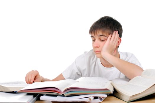 Tired and Bored Student on the School Desk Isolated on the White Background