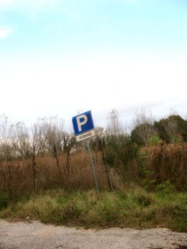 Empty parking in front of a firm without customers