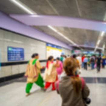 Blurred background of passenger walk at subway station