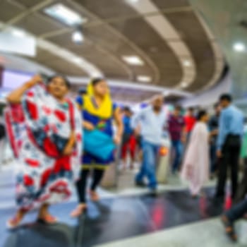 Blurred background of passenger walk at subway station