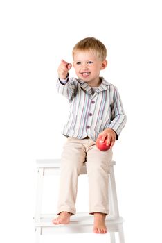 Boy in shirt shot in the studio on a white background