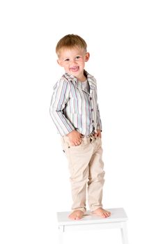 Boy in shirt shot in the studio on a white background