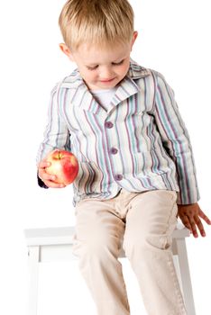 Boy in shirt shot in the studio on a white background