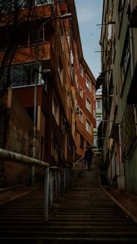 Alone man climbing stairs