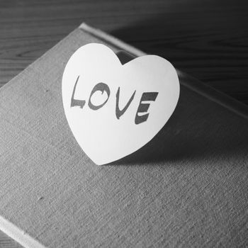 black and white paper heart write love word word