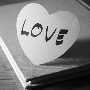 black and white paper heart write love word word