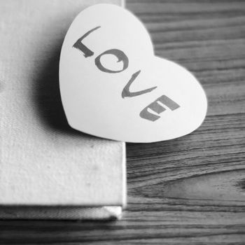 black and white paper heart write love word word