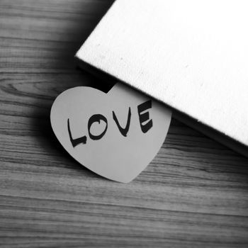 black and white paper heart write love word word