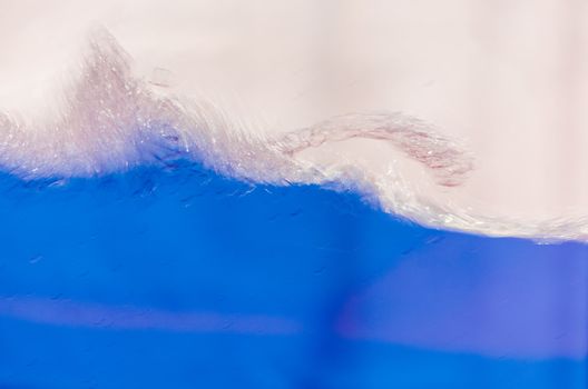 Close up of a blue liquid, water, background image.