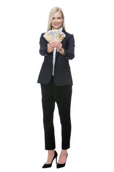 blonde businesswoman smiling and holding money