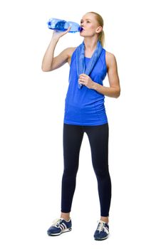 blonde woman wearing fitness clothing and drinking water