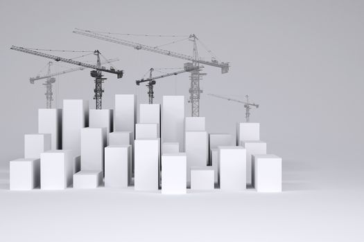 White cubes with wire-frame tower cranes on gray background. Concept of urban construction