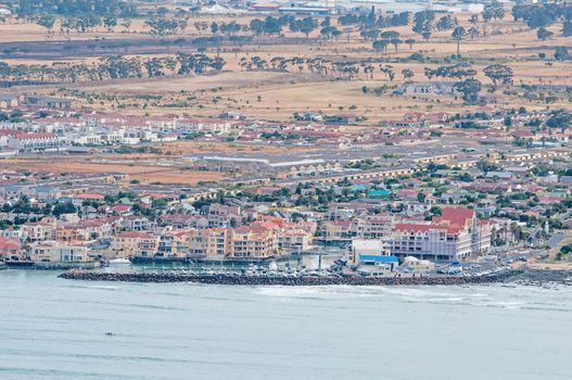 CAPE TOWN, SOUTH AFRICA - DECEMBER 20TH, 2014: A recreational harbor in Gordons Bay near Cape Town as seen from the start of Clarence Drive